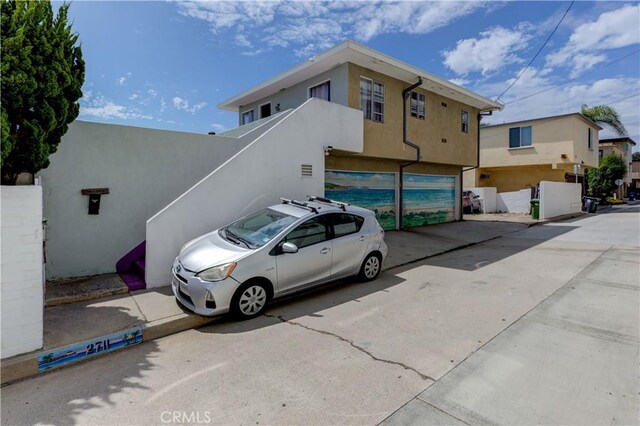 view of front of property featuring stucco siding