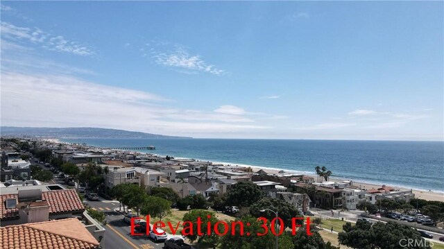 exterior space with a view of the beach and a water view