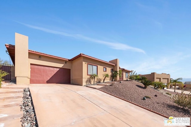 view of front of home featuring a garage