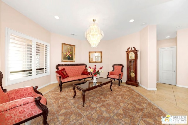 living room featuring a chandelier and tile patterned flooring