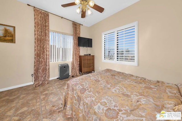 unfurnished bedroom featuring ceiling fan