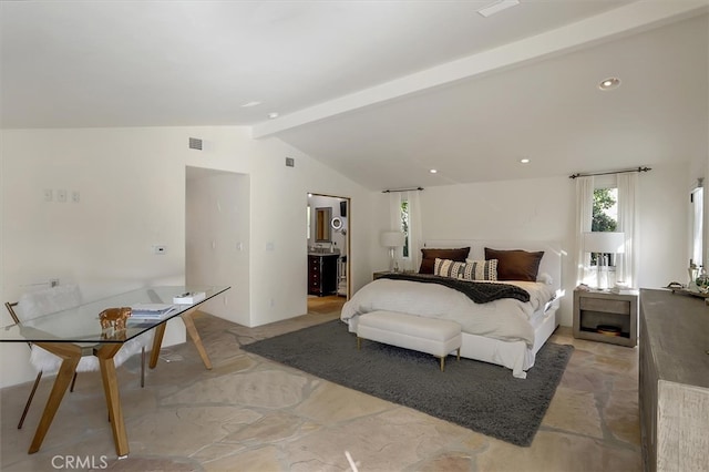 bedroom with lofted ceiling with beams