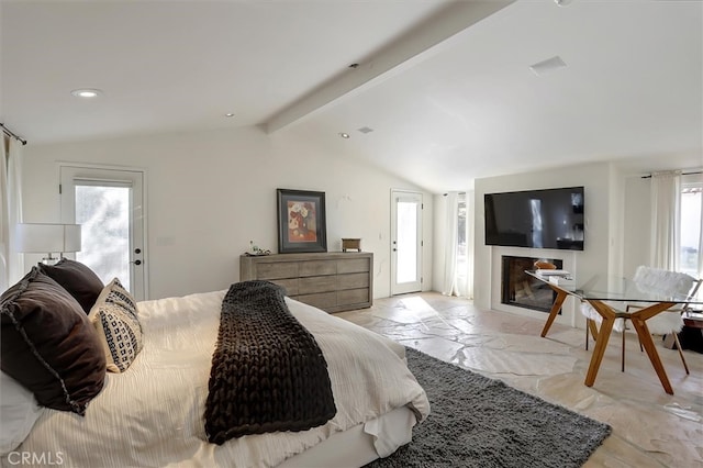 bedroom featuring lofted ceiling with beams