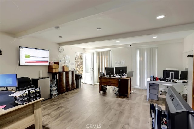 office space featuring beam ceiling and light hardwood / wood-style flooring