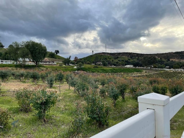 property view of mountains featuring a rural view