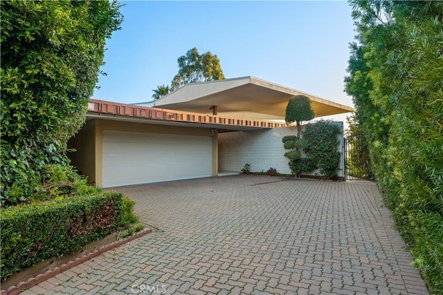 view of front of home with a garage