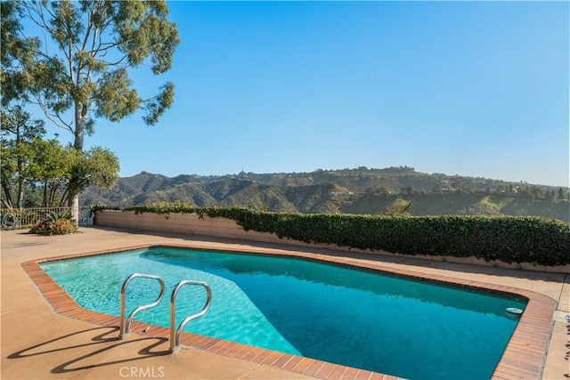 1470 Laurel Way, Beverly Hills, CA 90210 - view of pool featuring a fenced backyard, a mountain view, and a patio