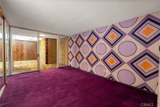 1470 Laurel Way, Beverly Hills, CA 90210 - carpeted spare room with wallpapered walls and a textured ceiling