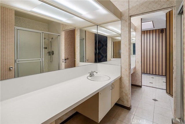 1470 Laurel Way, Beverly Hills, CA 90210 - bathroom with vanity, a stall shower, tile patterned flooring, and baseboards