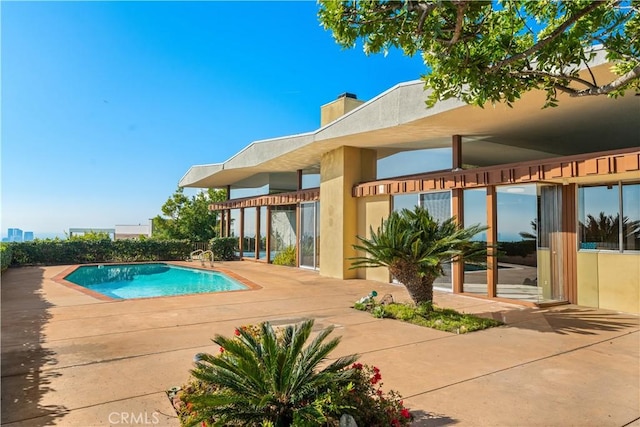 view of pool with a patio