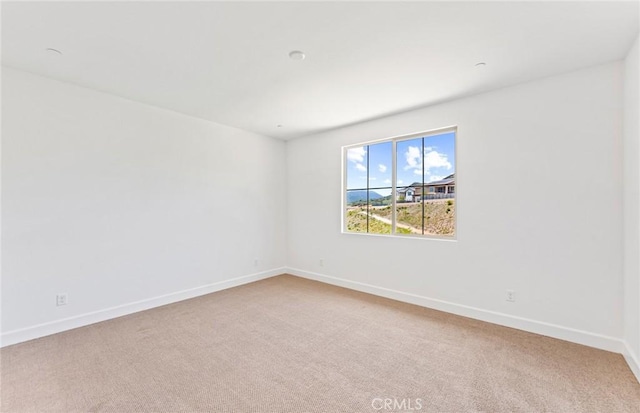 empty room with carpet flooring