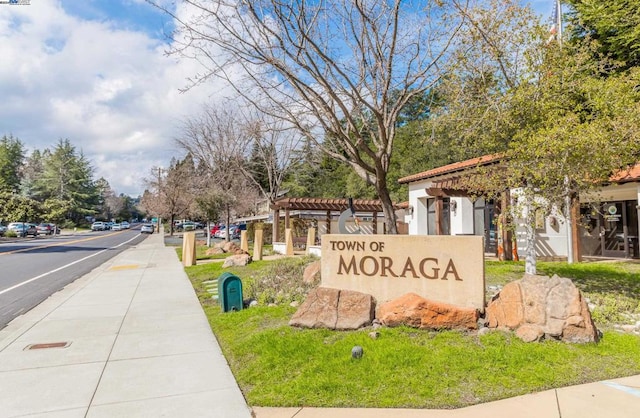 view of community sign