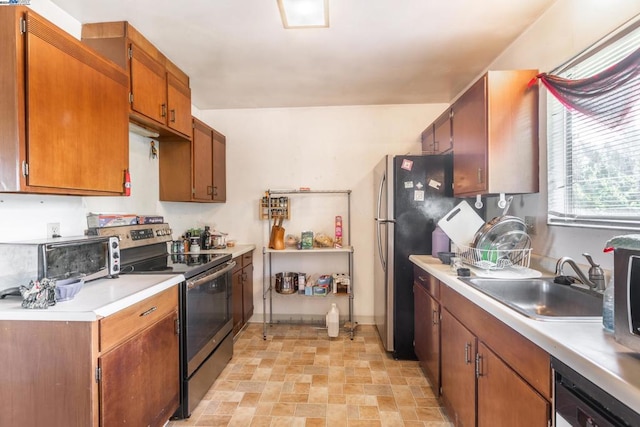 kitchen with stainless steel appliances and sink