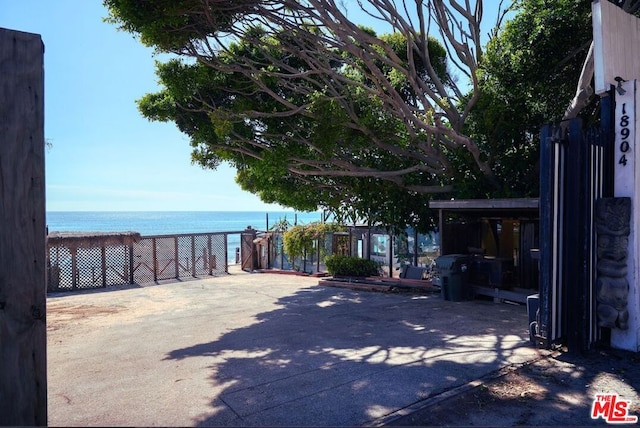 view of patio / terrace featuring a water view