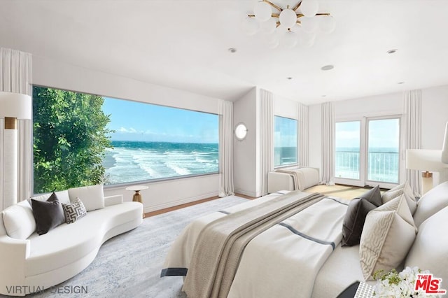 bedroom with light hardwood / wood-style flooring, a water view, and a notable chandelier