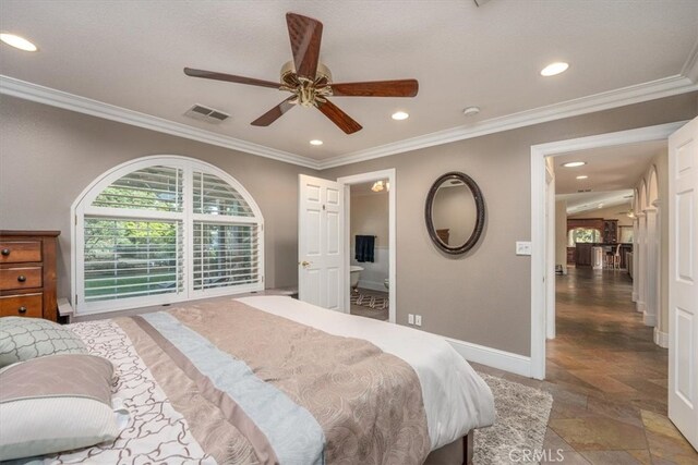 bedroom with ceiling fan and crown molding