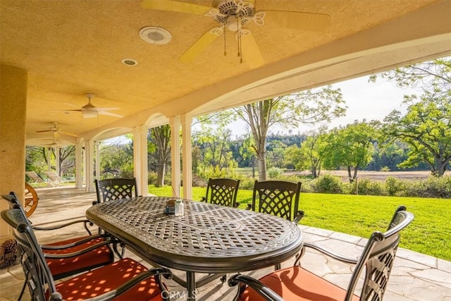 view of patio with ceiling fan