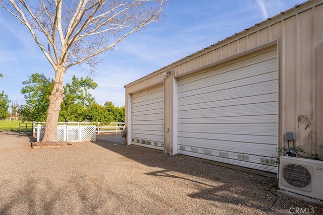 garage featuring ac unit