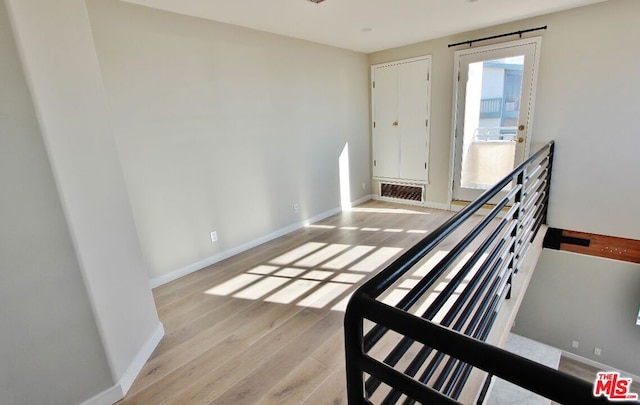 entrance foyer with light wood-type flooring