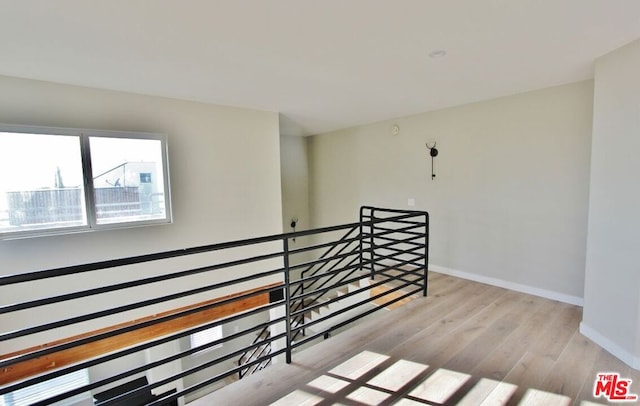 hallway featuring light hardwood / wood-style flooring