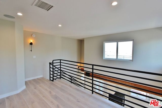 hall featuring light hardwood / wood-style floors