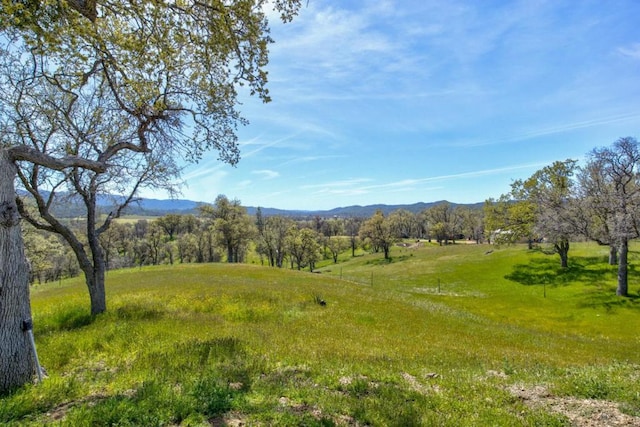 view of mountain feature with a rural view