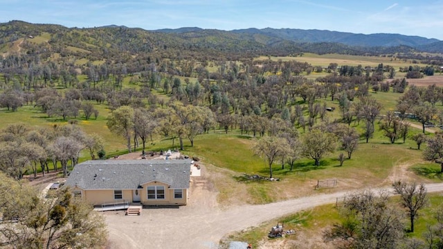 aerial view featuring a mountain view and a rural view