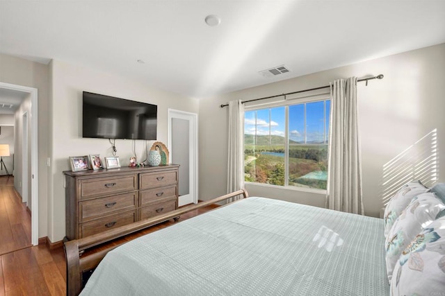 bedroom featuring hardwood / wood-style floors