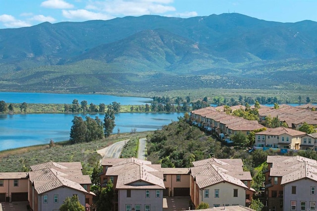 bird's eye view featuring a water and mountain view