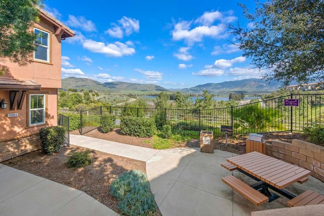 view of patio / terrace featuring a mountain view