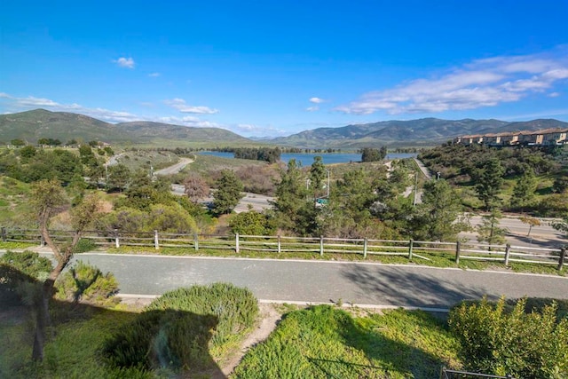 property view of mountains with a water view and a rural view