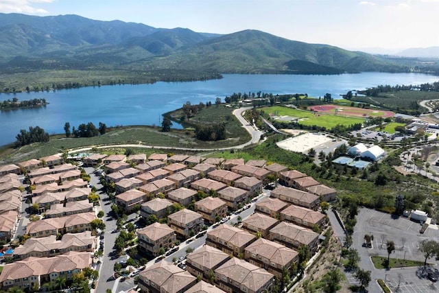 bird's eye view with a water and mountain view