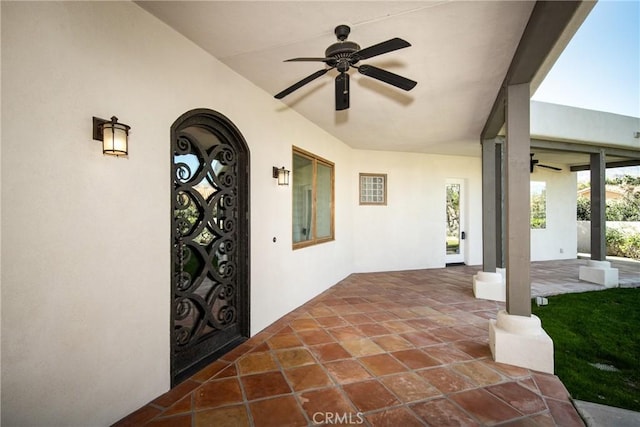 view of patio featuring ceiling fan