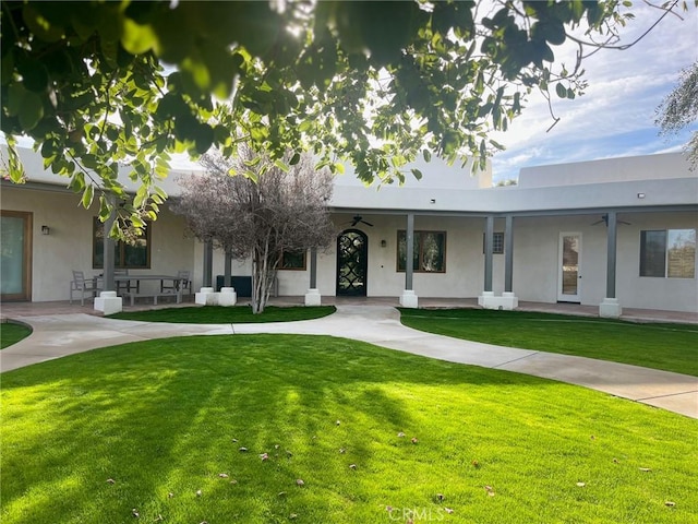 ranch-style house with a front yard