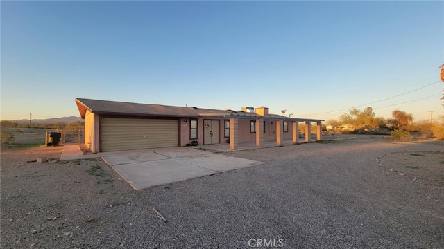 view of front of home with a garage