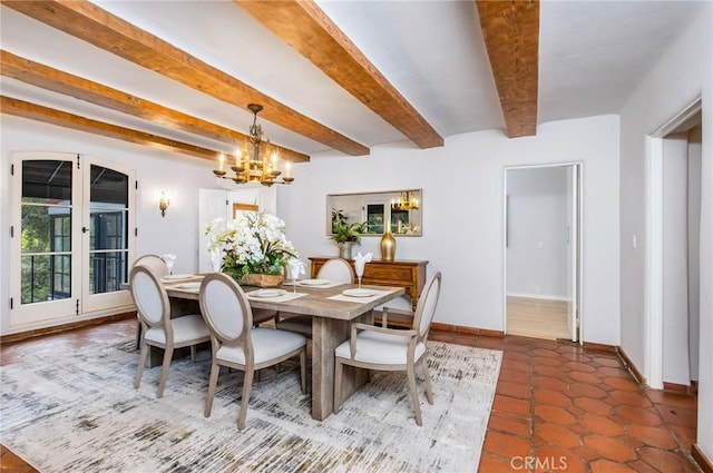 tiled dining area with beamed ceiling and a chandelier