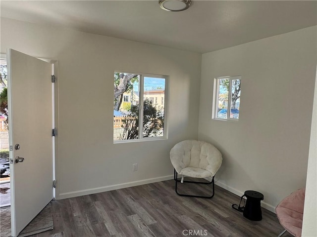 unfurnished room with dark hardwood / wood-style flooring