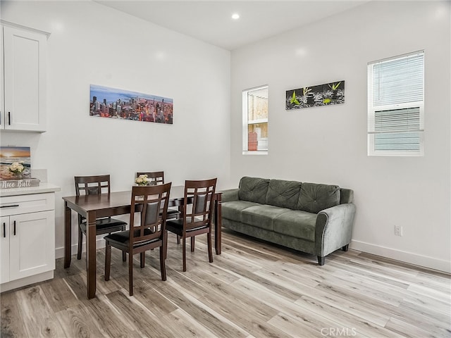 143 N Hobart Blvd, Los Angeles, CA 90004 - dining space with light hardwood / wood-style floors