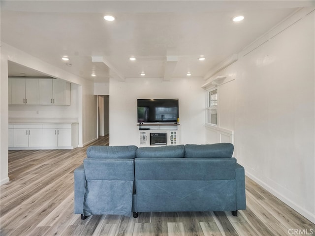 143 N Hobart Blvd, Los Angeles, CA 90004 - living room featuring beam ceiling and light hardwood / wood-style flooring