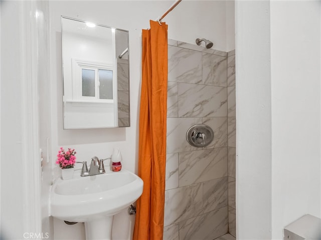 143 N Hobart Blvd, Los Angeles, CA 90004 - bathroom with sink and a shower with shower curtain