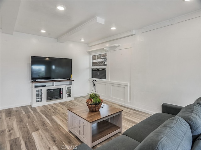 143 N Hobart Blvd, Los Angeles, CA 90004 - living room with beam ceiling and light hardwood / wood-style flooring