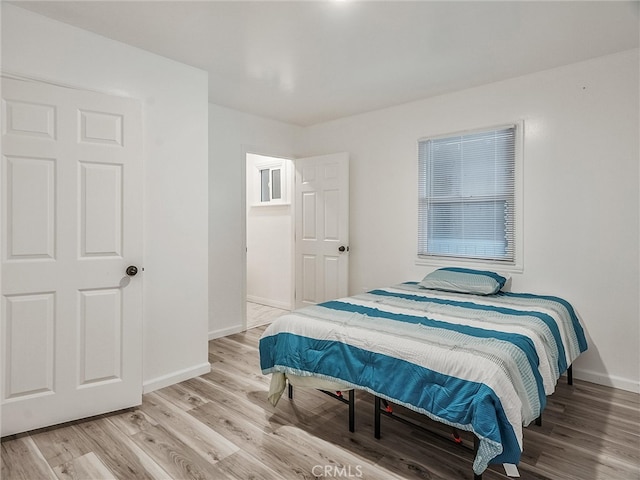 143 N Hobart Blvd, Los Angeles, CA 90004 - bedroom with light wood-type flooring