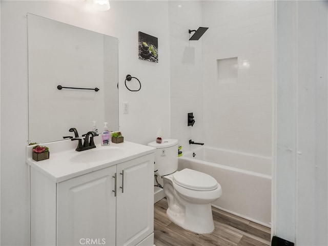 143 N Hobart Blvd, Los Angeles, CA 90004 - full bathroom with vanity, tiled shower / bath combo, wood-type flooring, and toilet