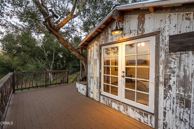 wooden deck featuring french doors