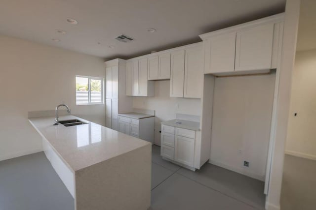 kitchen with white cabinets and sink