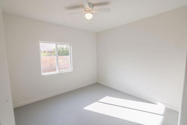 unfurnished room featuring ceiling fan