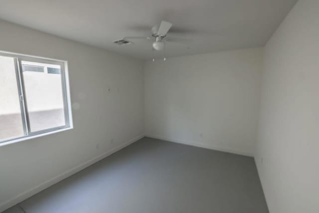 empty room featuring ceiling fan