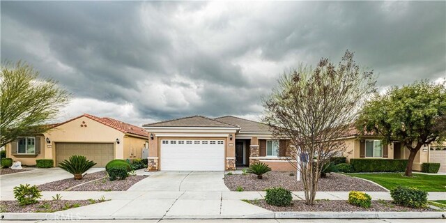 view of front of property with a garage