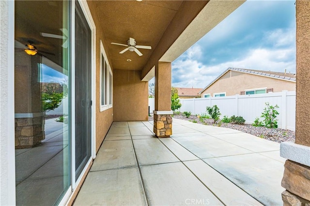 view of patio with ceiling fan