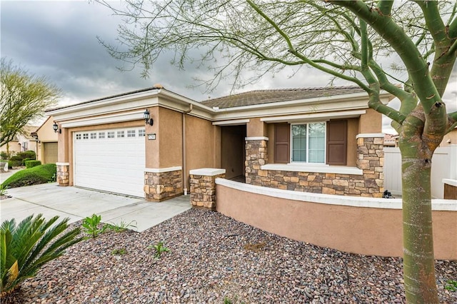 ranch-style house featuring a garage